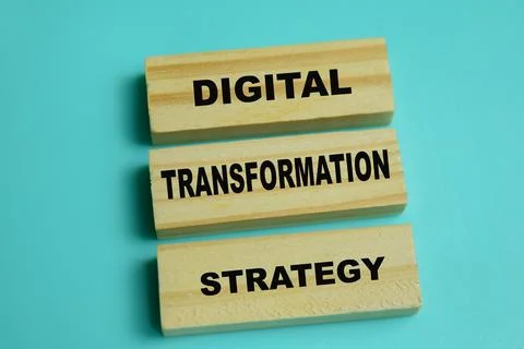 Concept of digital transformation strategy text on wooden blocks. Stock Photos