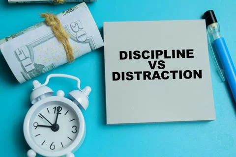 Concept of discipline vs distraction write on sticky notes isolated on table. Stock-Fotos
