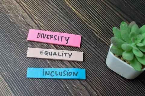Concept of Diversity, Equality, Inclusion write on sticky notes Stock Photos