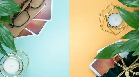 Concept of divination, magic and esotericism. Cards candle on cartomancy tabl Stock Photos
