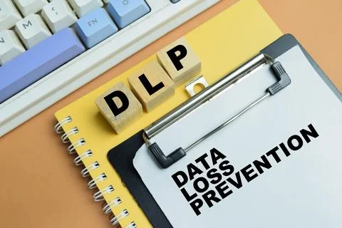 Concept of DLP - Data Loss Prevention write on clipboard isolated on table. Stock Photos