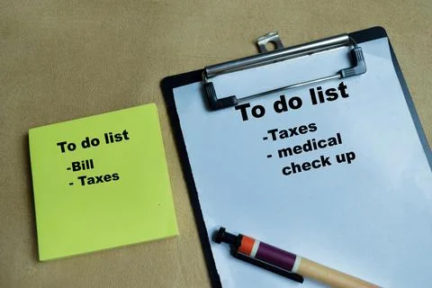 Concept of to do list write on sticky notes isolated on Wooden Table. Stock Photos