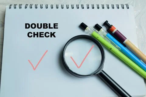 Concept of double check with verification process write on book Stock Photos