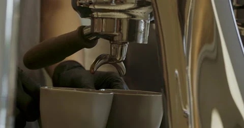 Concept Drinking roasted black coffee in the morning. Pouring coffee stream from Stock Footage 237829543