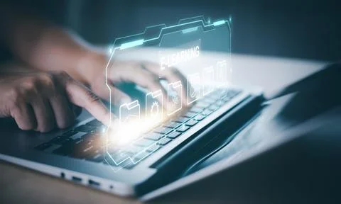 Concept E-learning education, using a laptop with an Online Education icon on Stock Photos