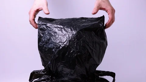 The concept of Earth Day. Save our planet from pollution by plastic bags. Stock Footage 121545071