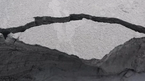 Concept of earthquake. Landslide of coastal sand cliffs due to earthquakes. Stock Footage 228143353