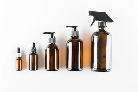 Concept of ecological cosmetics without plastic in glass bottles Stock Photos