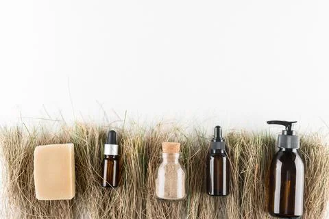 Concept of ecological cosmetics without plastic in glass bottles Stock Photos