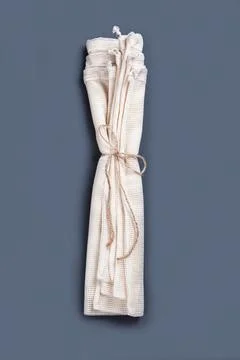 The concept of the ecological etiquette - reusable string bags folded by rope. Stock Photos