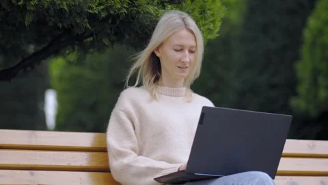 Concept of education. Freelancer. smiling female student using laptop computer Stockbeeldmateriaal 240337705