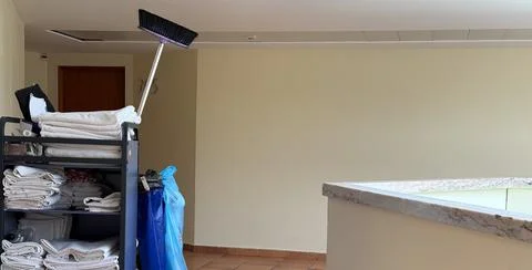 Concept of efficient hotel housekeeping and maintenance, ready for service. Stock Photos