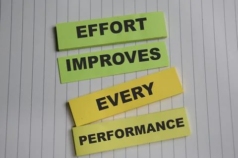 Concept of effort improves every performance write on sticky notes Foto stock