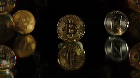 The concept of electronic payments using Bitcoin cryptocurrency Stock Footage 168771778