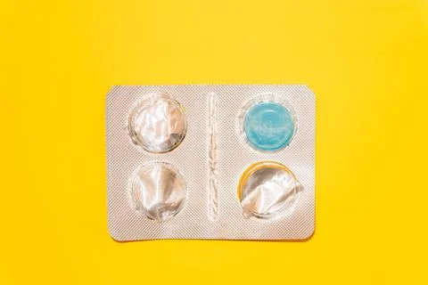 Concept Empty pill blister pack, yellow background, virus and disease, pill 写真素材