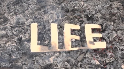 The concept of the end of life or existence. The symbol of time is on fire. Stock Footage 118725449