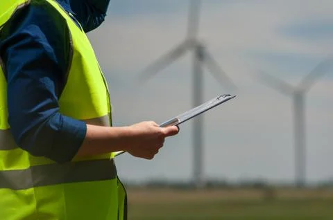 Concept of engineers and windmills Stock Photos