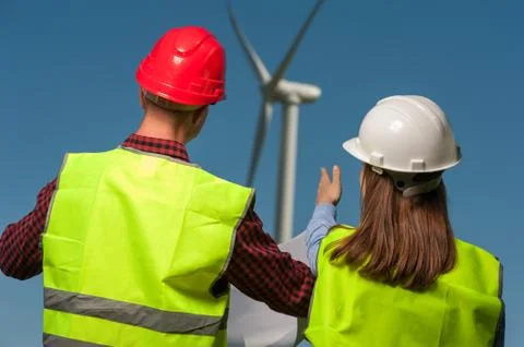 Concept of engineers and windmills Stock Photos