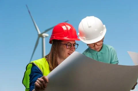 Concept of engineers and windmills Stock Photos