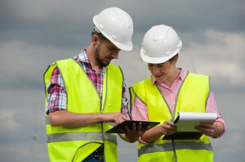 Concept of engineers and windmills Stock Photos