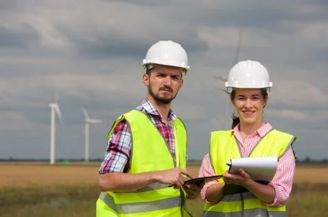 Concept of engineers and windmills Stock Photos