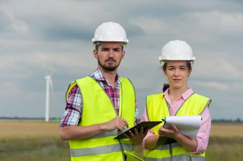 Concept of engineers and windmills Stock Photos