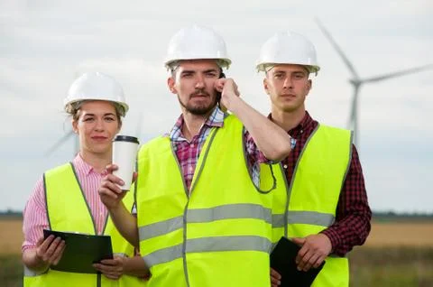 Concept of engineers and windmills Stock Photos