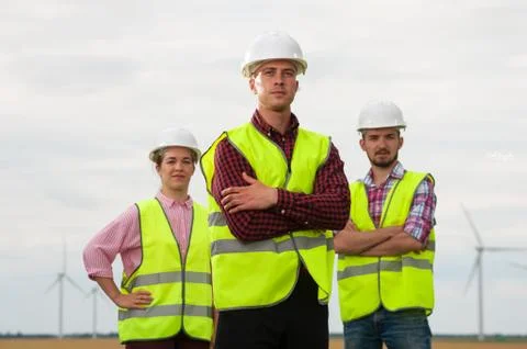 Concept of engineers and windmills Stock Photos