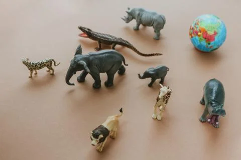 The concept of an environmental disaster. planet Earth and the animals leaving Stock Photos