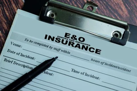 Concept of Errors and Omissions Insurance write on paperwork Stock Photos