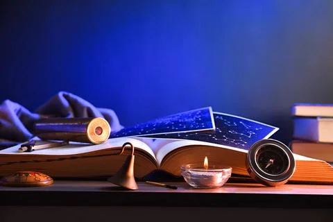 Concept of exploring planets and constellations objects on table Stock Photos