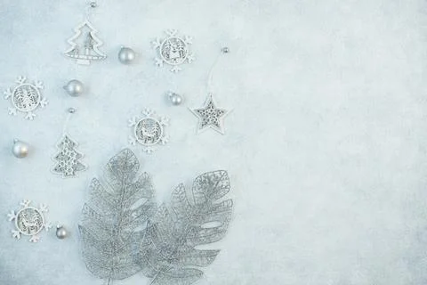 The concept of a festive background in silver tones. Top view of the silver b Stock Photos