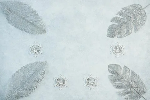 The concept of a festive background in silver tones. Top view of the silver b Stock Photos