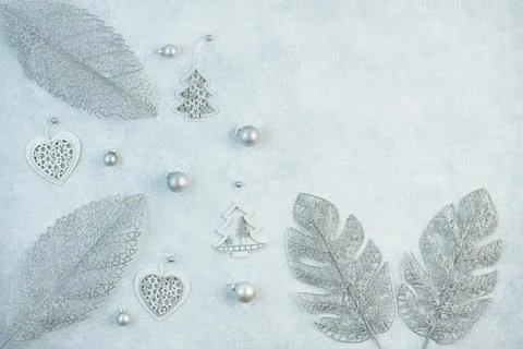 The concept of a festive background in silver tones. Top view of the silver b Stock Photos