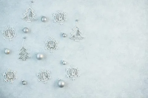 The concept of a festive background in silver tones. Top view of the silver b Stock Photos