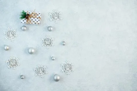 The concept of a festive background in silver tones. Top view of the silver b Stock Photos