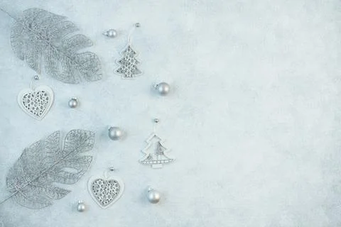 The concept of a festive background in silver tones. Top view of the silver b Stock Photos