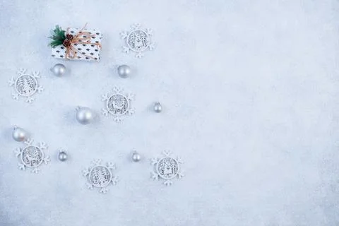 The concept of a festive background in silver tones. Top view of the silver b Stock Photos