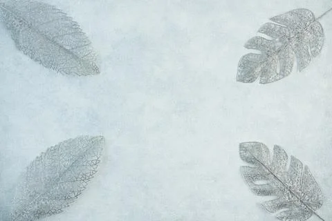 The concept of a festive background in silver tones. Top view of the silver b Stock Photos