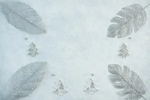 The concept of a festive background in silver tones. Top view of the silver b Stock Photos