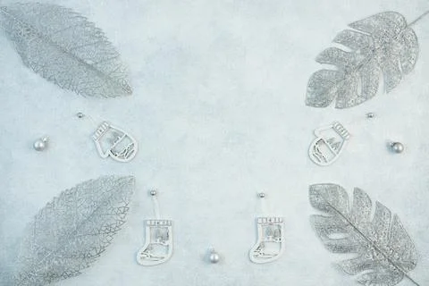 The concept of a festive background in silver tones. Top view of the silver b Stock Photos