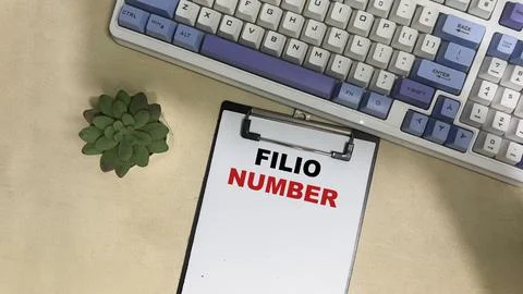Concept of Filio Number write on paperwork isolated on Wooden Table. Stock Photos