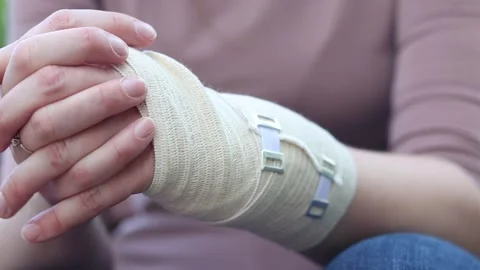Concept of first aid, treatment of injuries. Injured hand 스톡 동영상 344308664