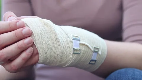 Concept of first aid, treatment of injuries. Injured hand 스톡 동영상 344308741