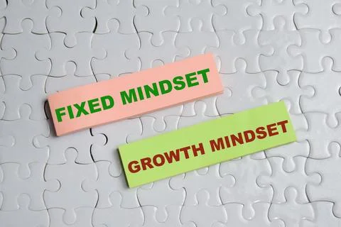Concept of fixed mindset or growth mindset write on sticky notes Stock Photos