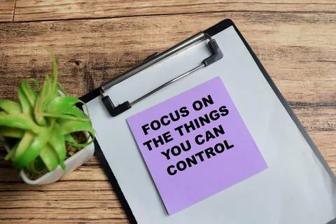 Concept of focus on the things you can control write on sticky notes Stock Photos