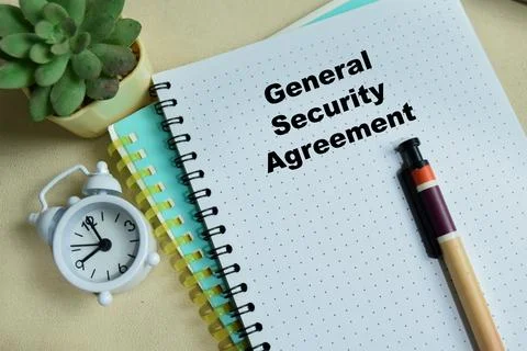 Concept of general security agreement write on book isolated on Wooden Table Stock Photos