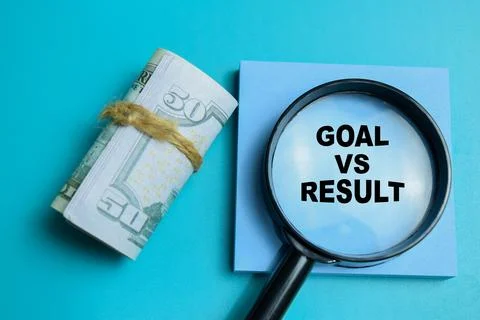 Concept of goal vs result write on sticky notes isolated on table. Stock Photos