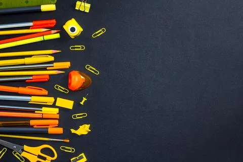 The concept of going back to school. Yellow-orange school supplies, pencils 스톡 사진