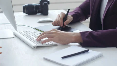 Concept of graphic design and professional photography. Young male graphic Stock Footage 99775583